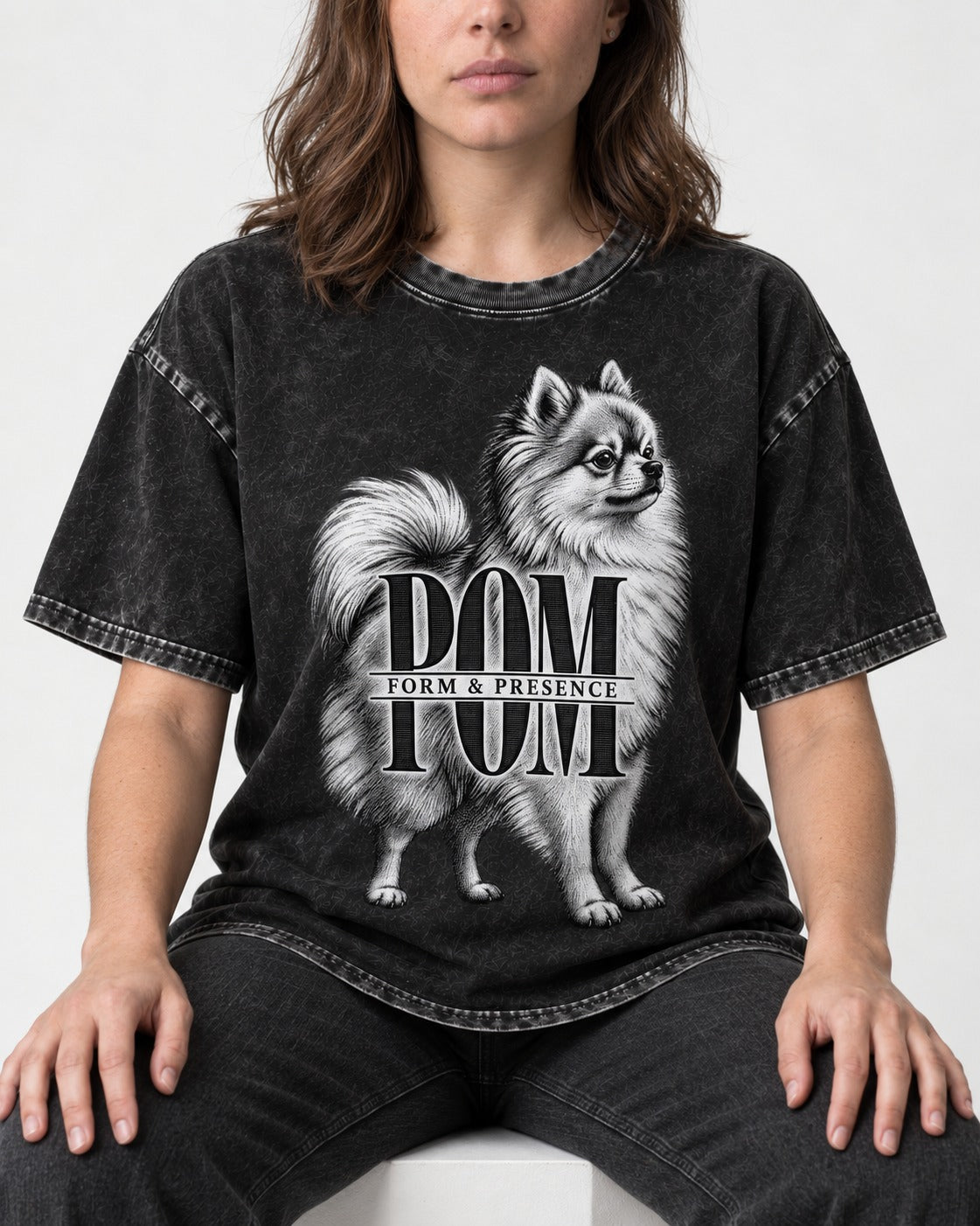 Pomeranian Form and Presence Monogram Graphic Washed Tee in Black, worn by a seated model
