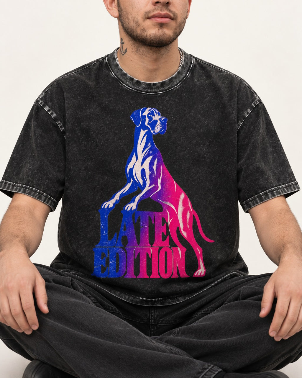 Great Dane Latest Edition Gradient Graphic Washed Tee in Black, worn by a seated model