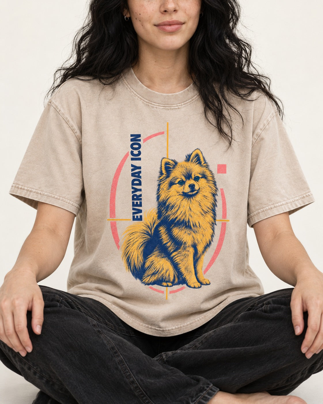Pomeranian Everyday Icon Washed Tee in Apricot, worn by a seated model