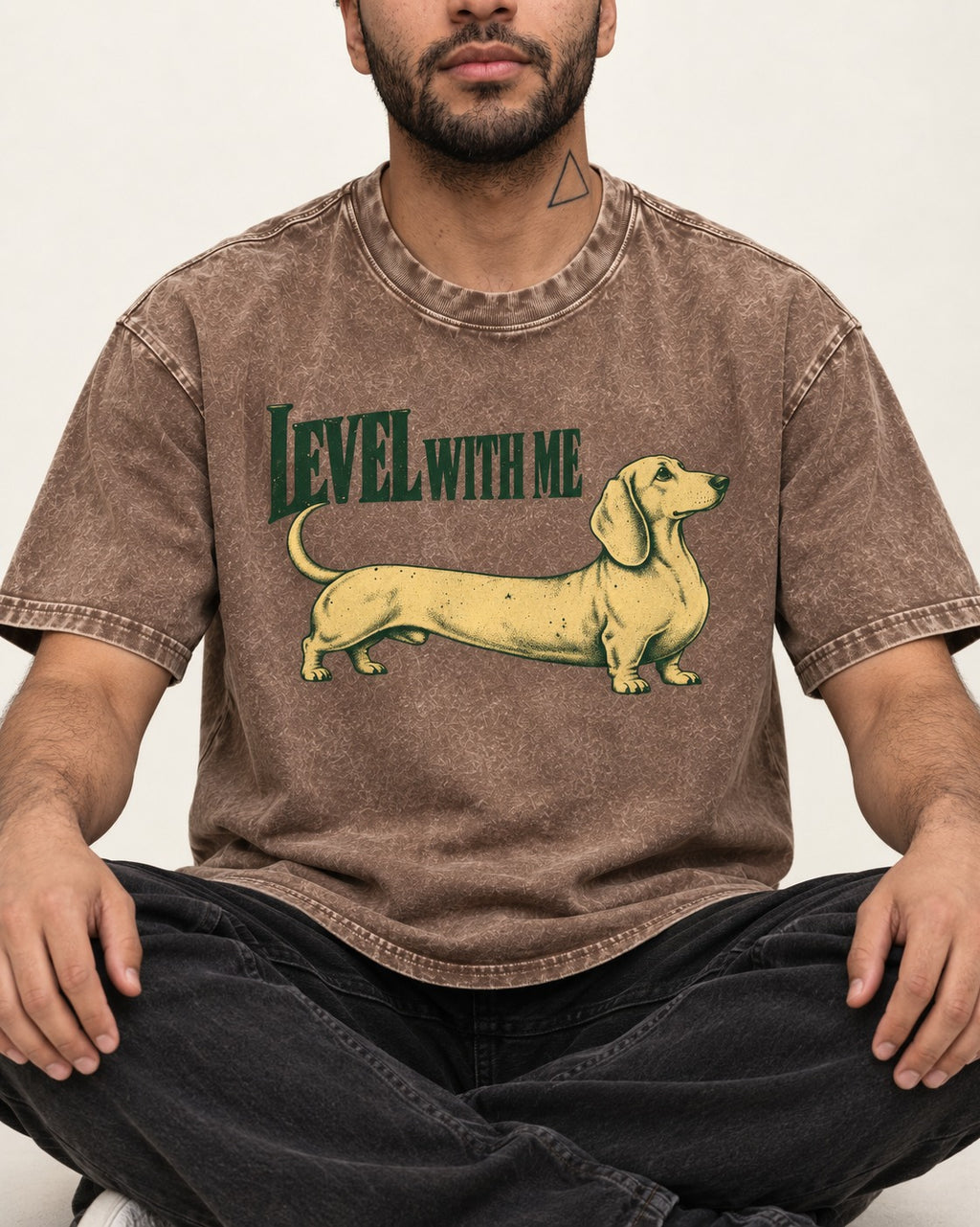 Dachshund Level with Me Washed Tee in Coffee, worn by a seated model
