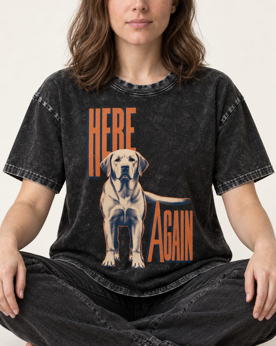 Labrador Retriever Here Again Standing Typography Graphic Washed Tee in Black, worn by a seated model