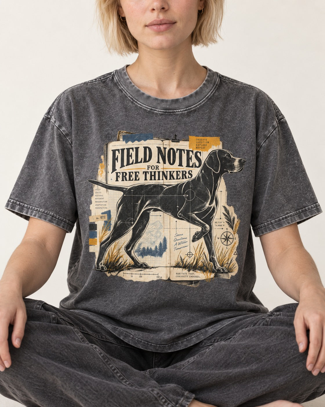 Field Notes for Free Thinkers Collage German Shorthaired Pointer Graphic Washed Tee in Gray, worn by a seated model