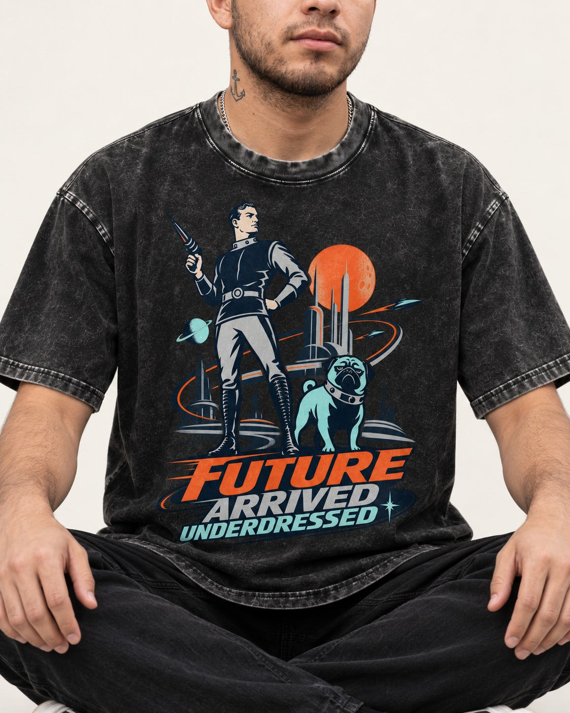 Pug Future Arrived Underdressed Space Hero Graphic Washed Tee in Black, worn by a seated model
