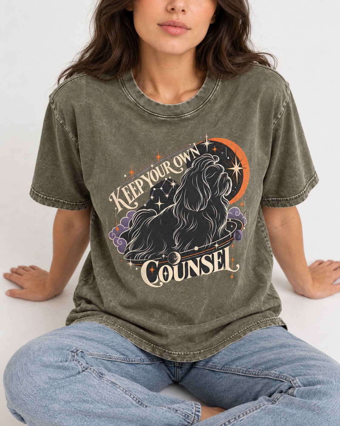 Shih Tzu Keep Your Own Counsel Celestial Graphic Washed Tee in Army Green, worn by a seated model