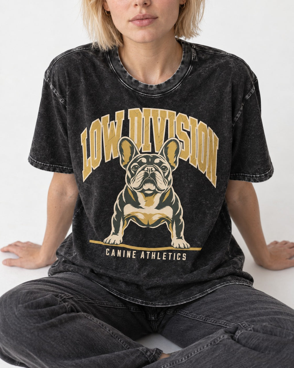 Frenchie Low Division Canine Athletics Graphic Washed Tee in Black, worn by a seated model