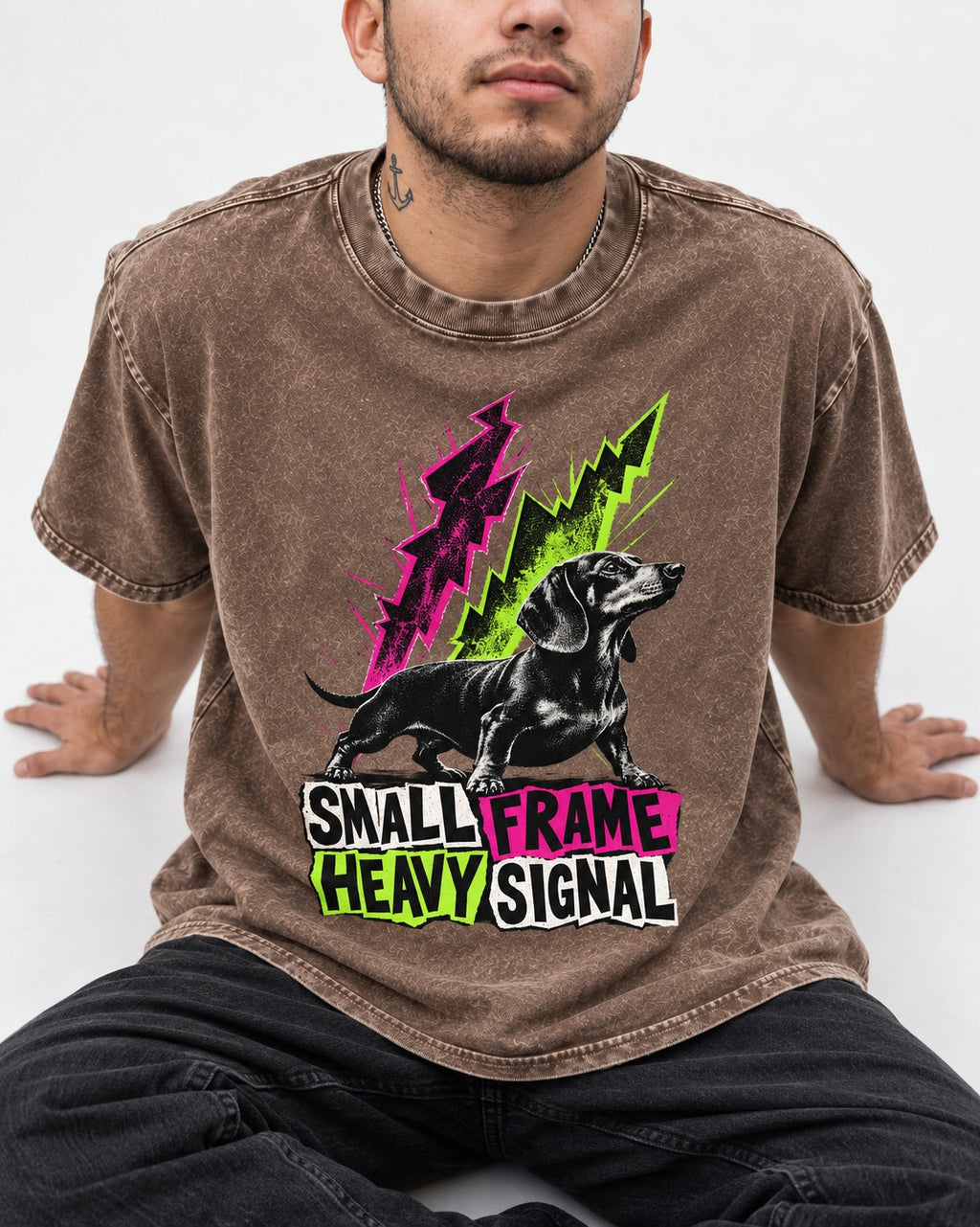 Dachshund Small Frame Heavy Signal Washed Tee in Coffee, worn by a seated model