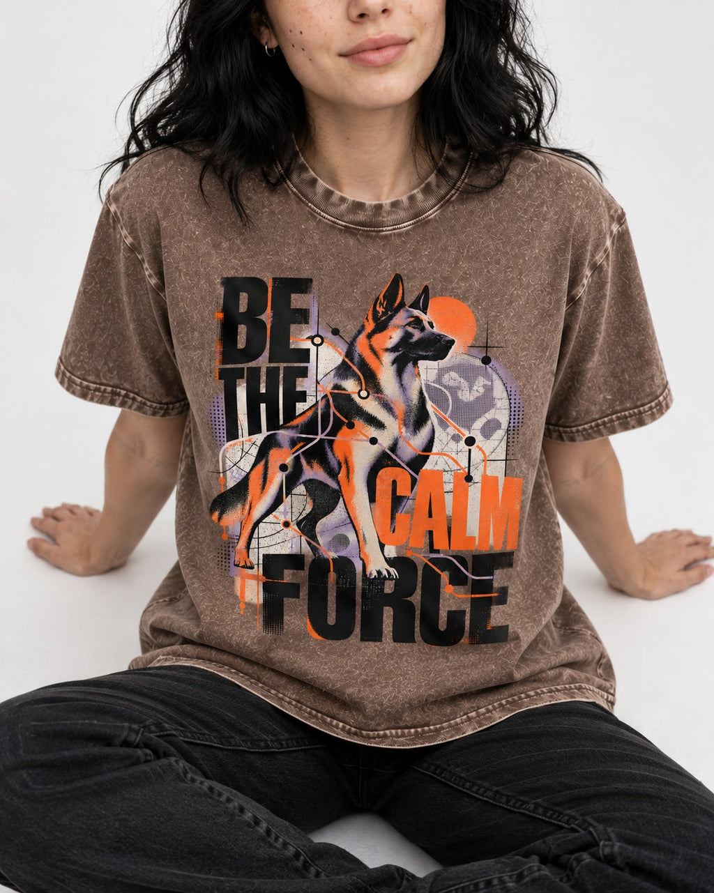 Be the Calm Force German Shepherd Dog Washed Tee in Coffee, worn by a seated model