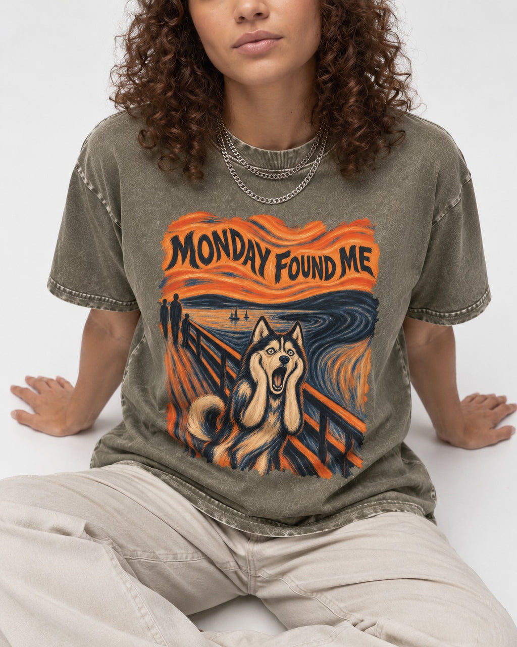Husky Monday Found Me Scream Parody Graphic Washed Tee in Army Green, worn by a seated model