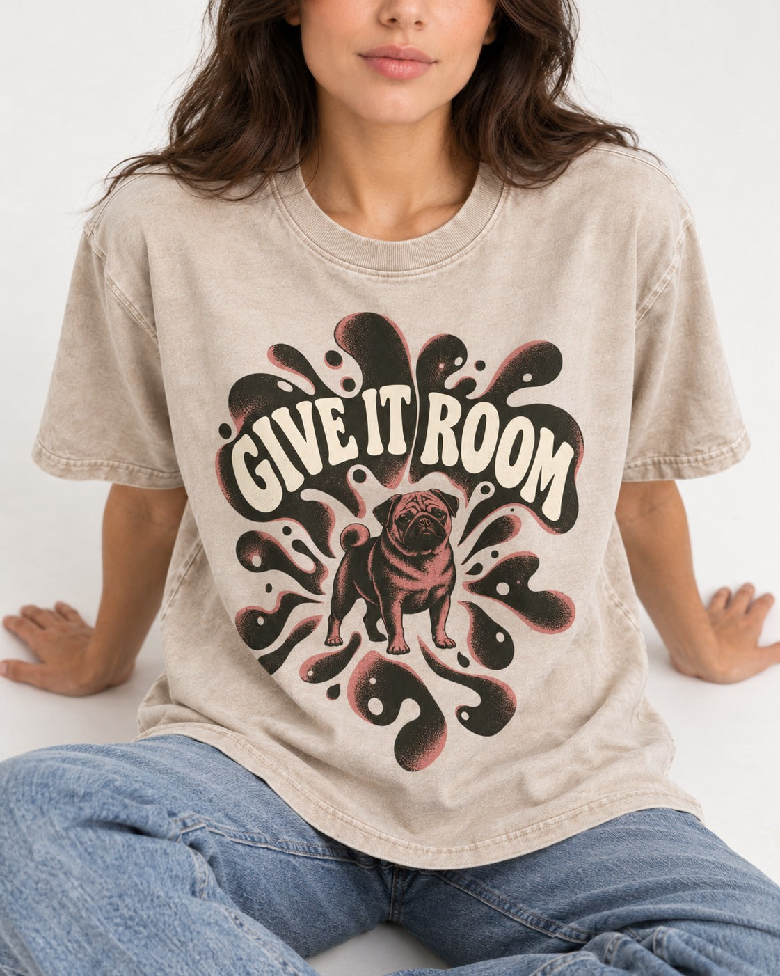 Give Pug Room Washed Tee in Apricot, worn by a seated model
