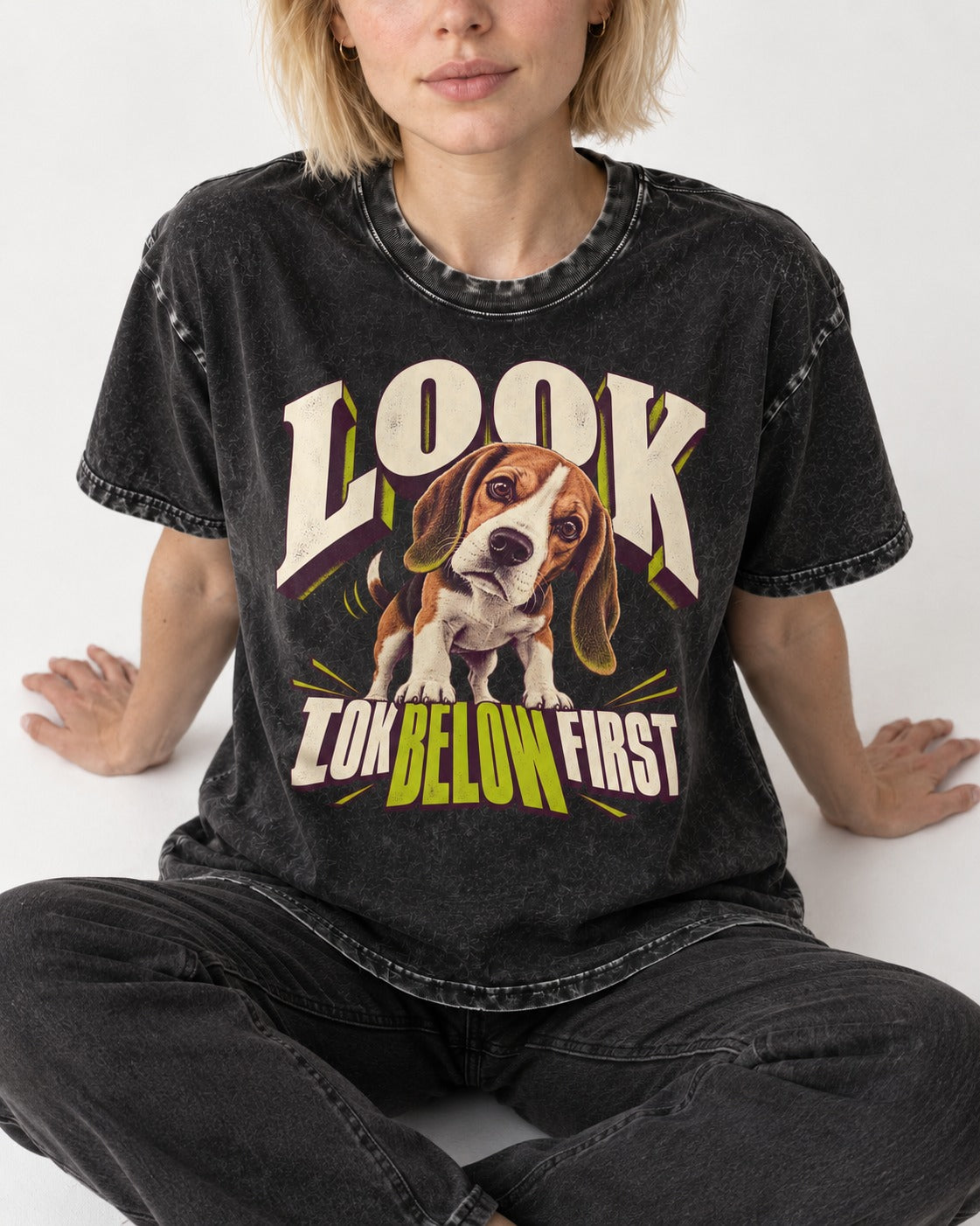 Beagle Look Low Below First Washed Tee in Black, worn by a seated model