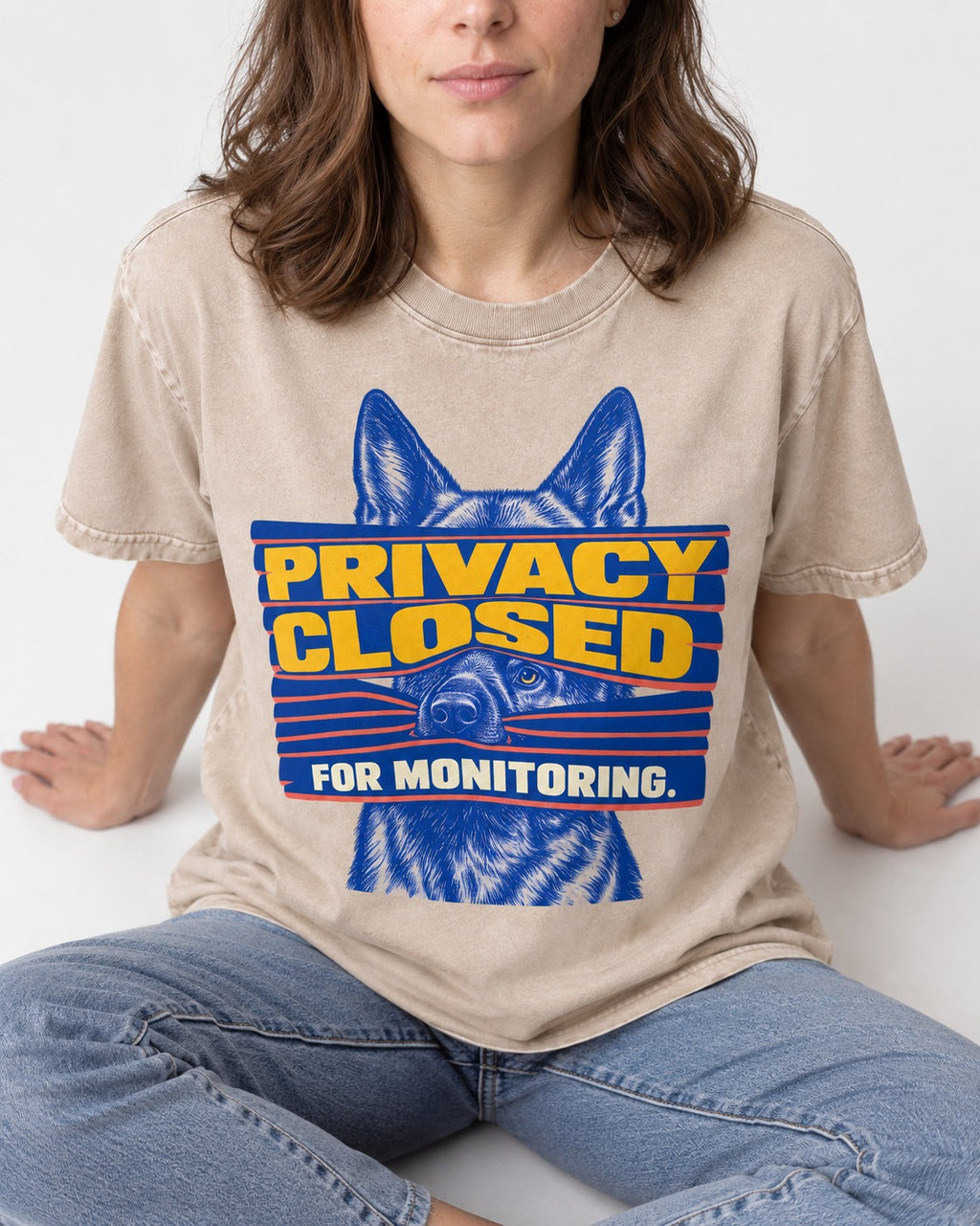 German Shepherd Dog Privacy Closed for Monitoring Washed Tee in Apricot, worn by a seated model