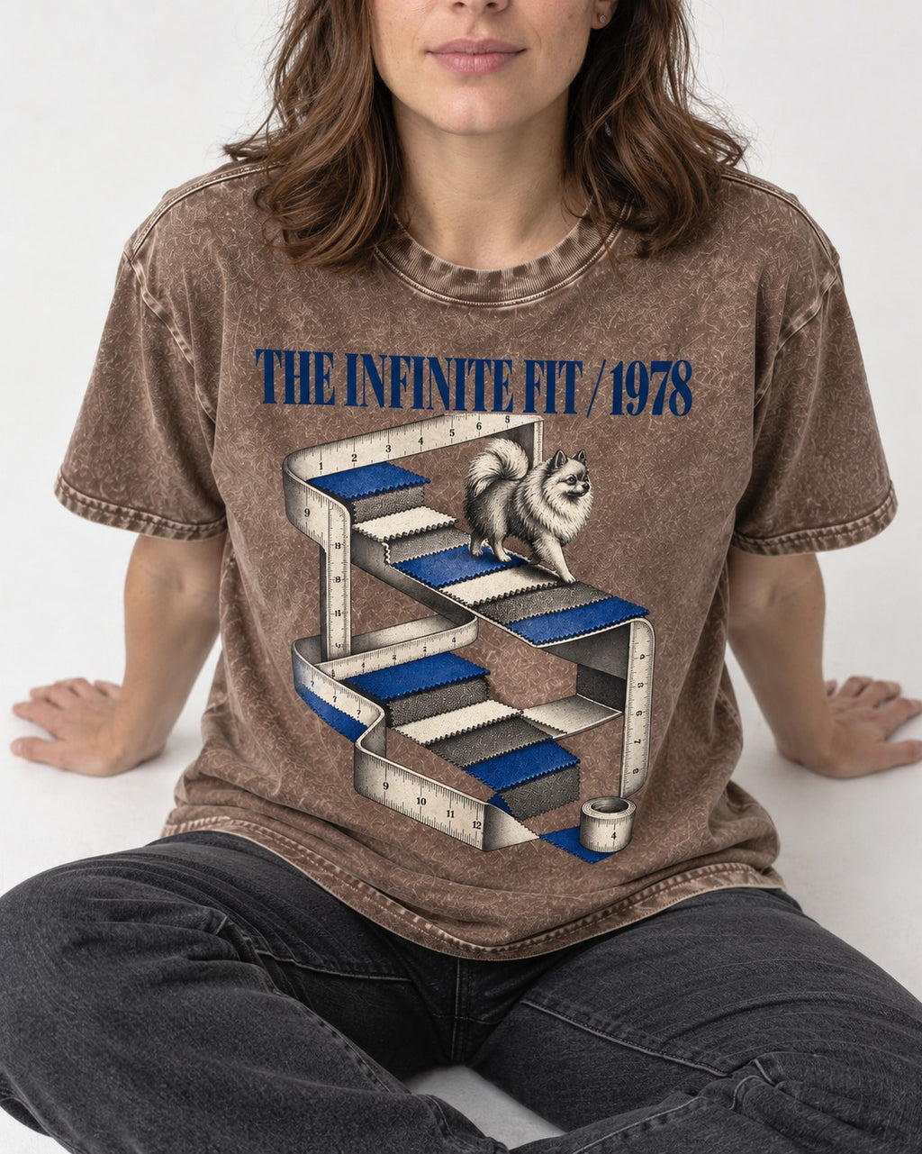 The Infinite Pomeranian Fit Washed Tee in Coffee, worn by a seated model