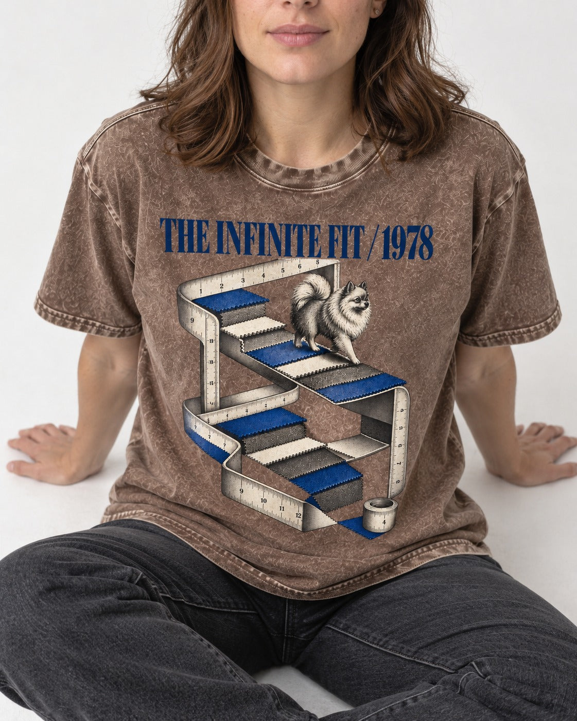 The Infinite Pomeranian Fit Washed Tee in Coffee, worn by a seated model
