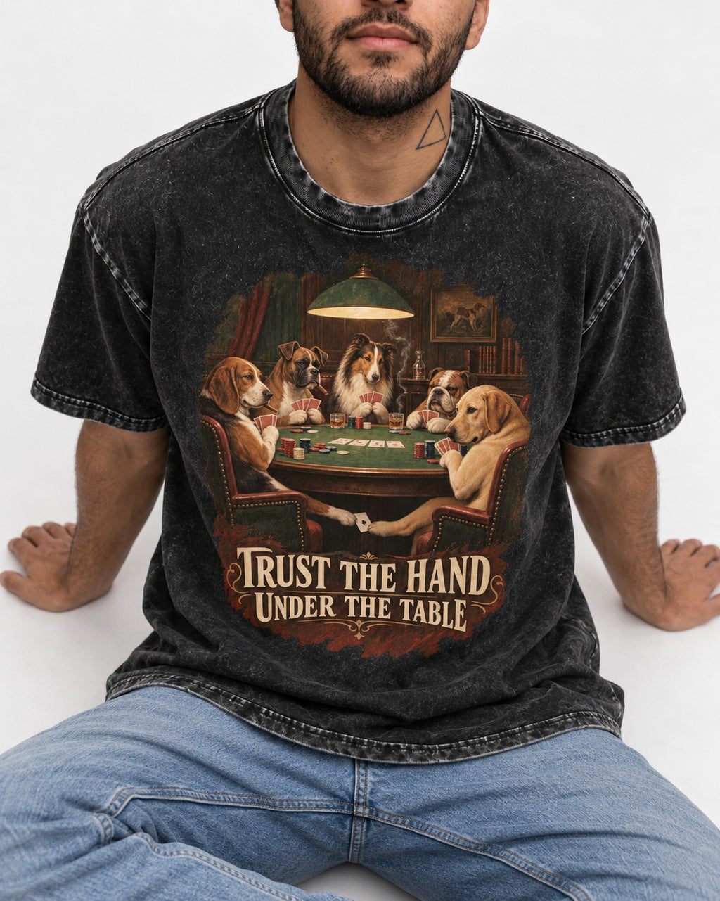 Labrador Retriever Trust the Hand Under the Table Poker Dogs Graphic Washed Tee in Black, worn by a seated model