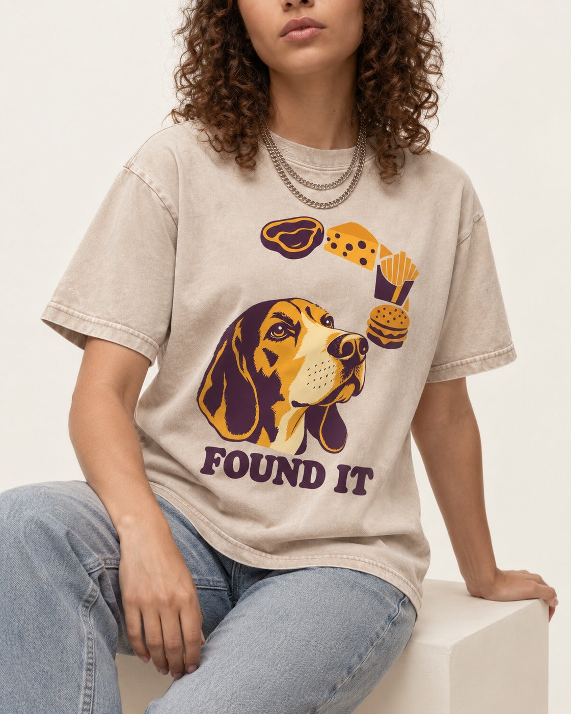 Beagle Found It Washed Tee in Apricot, worn by a seated model