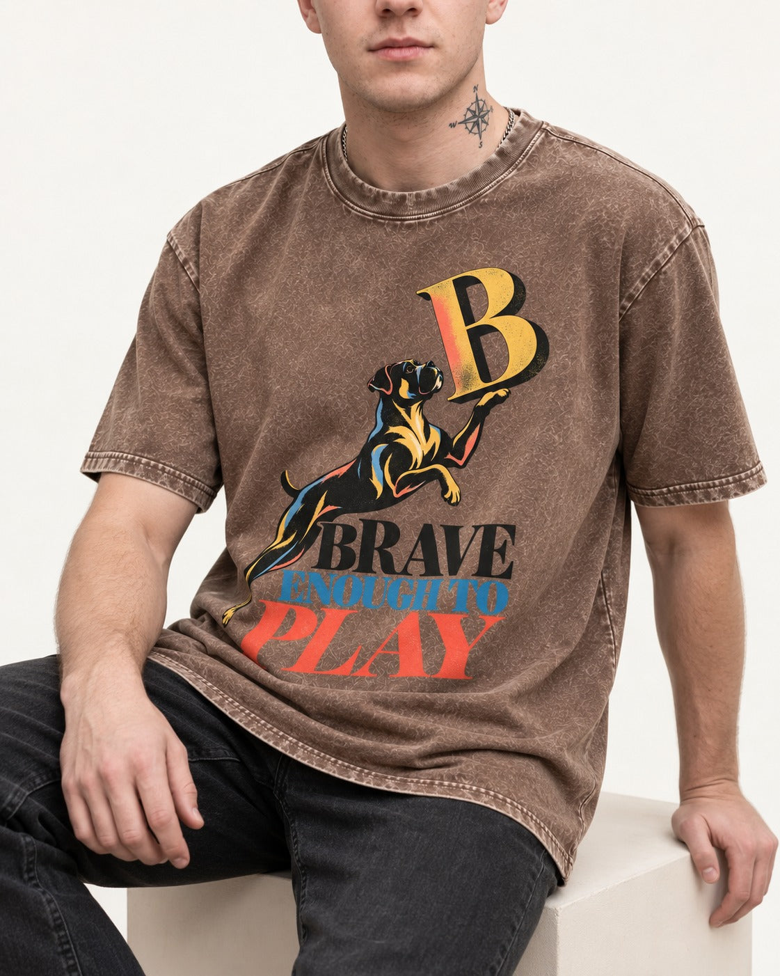 Boxer Brave Enough to Play Washed Tee in Coffee, worn by a seated model