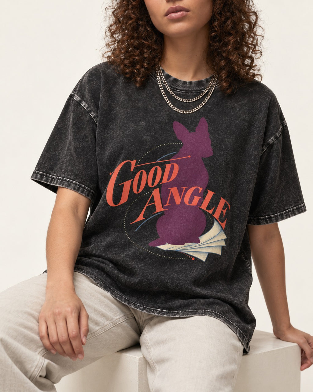 Good Angle Boston Terrier Paper Graphic Washed Tee in Black, worn by a seated model