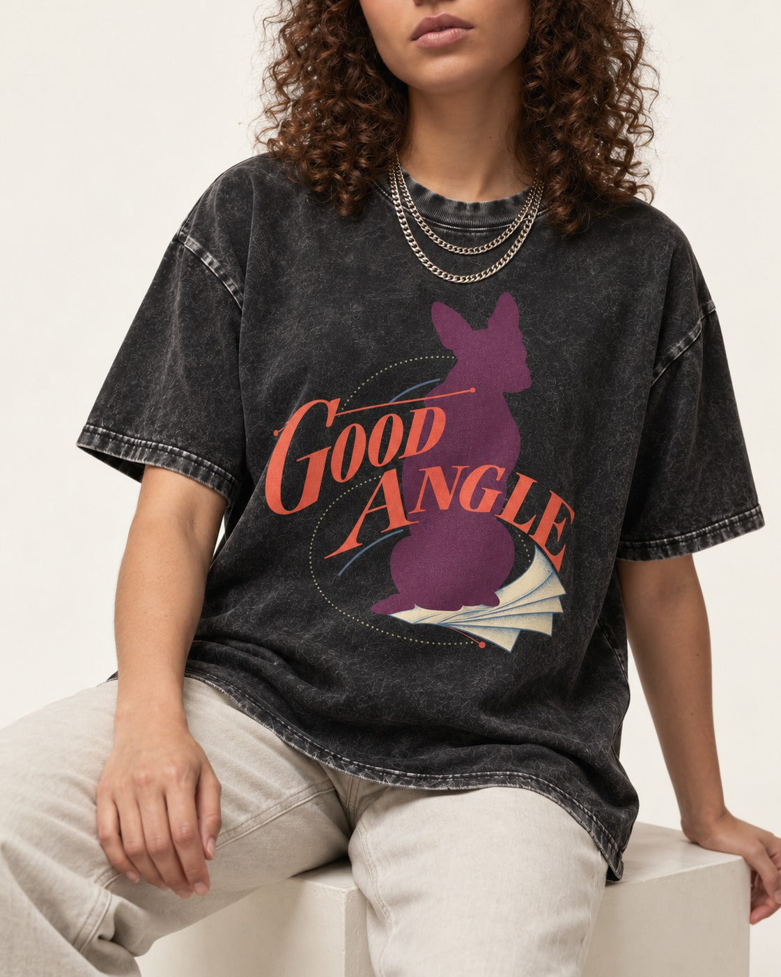 Good Angle Boston Terrier Paper Graphic Washed Tee in Black, worn by a seated model