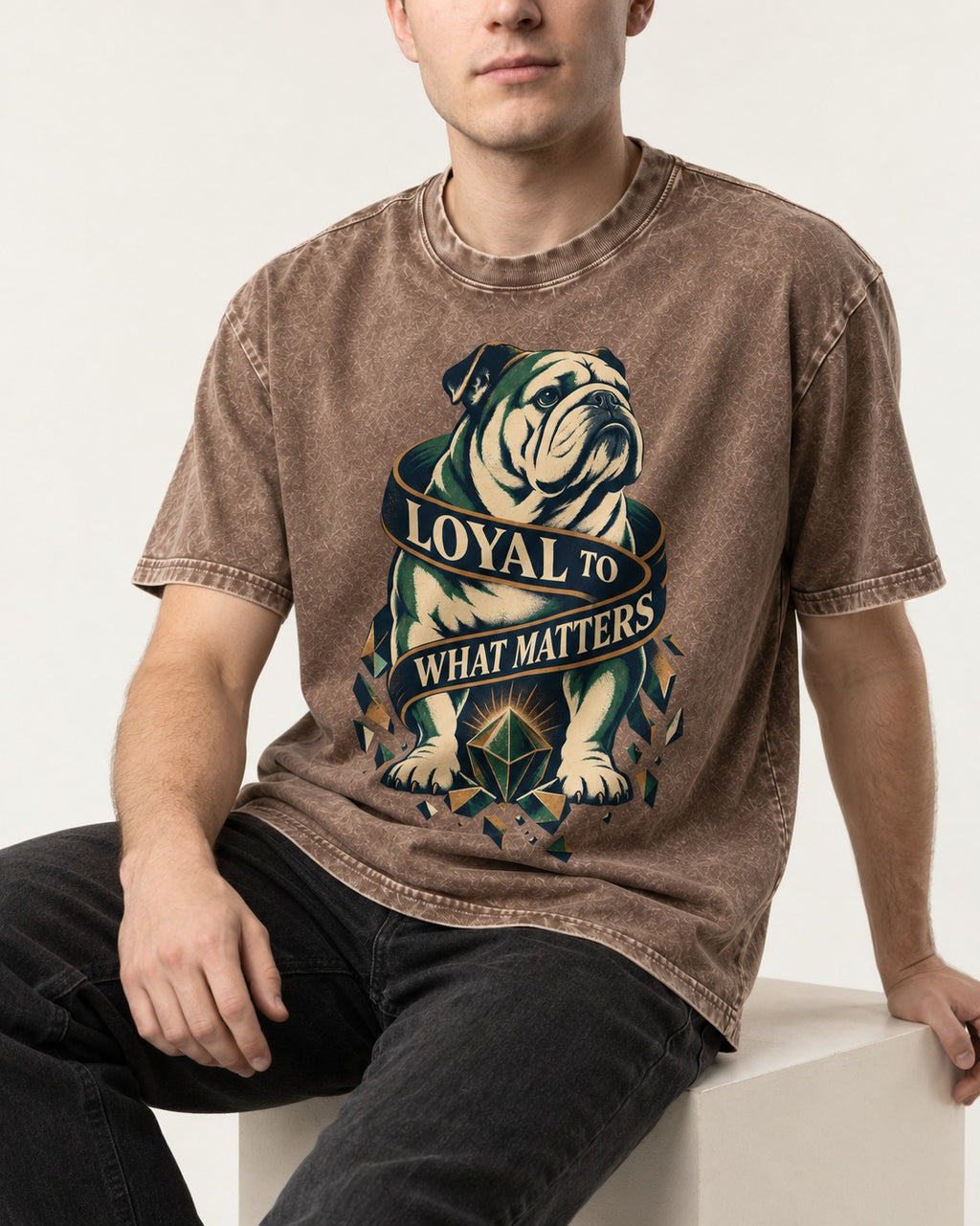 Loyal to What Matters English Bulldog Washed Tee in Coffee, worn by a seated model