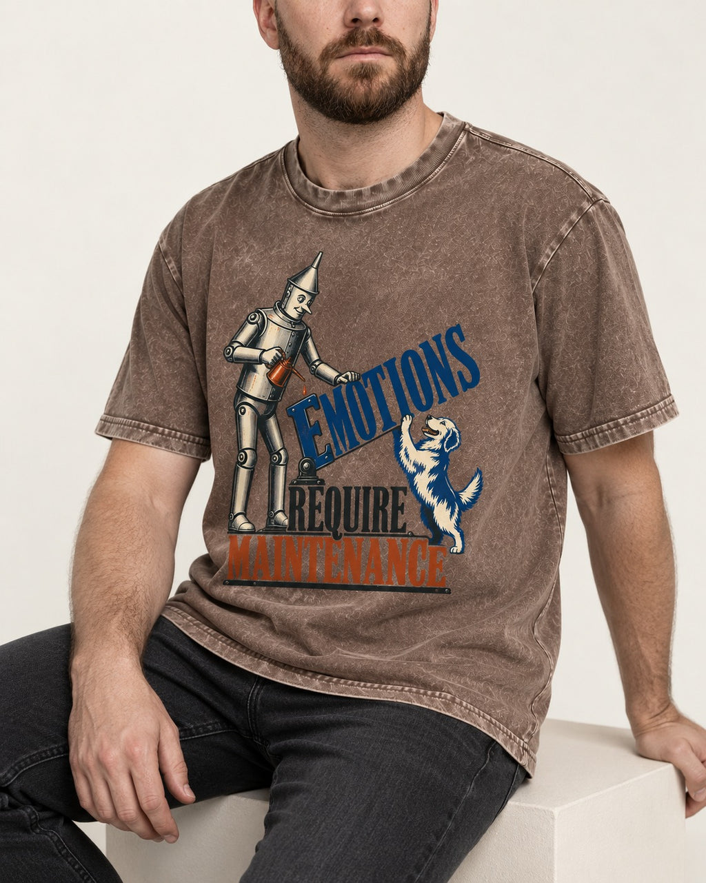 Golden Retriever Emotions Require Maintenance Washed Tee in Coffee, worn by a seated model