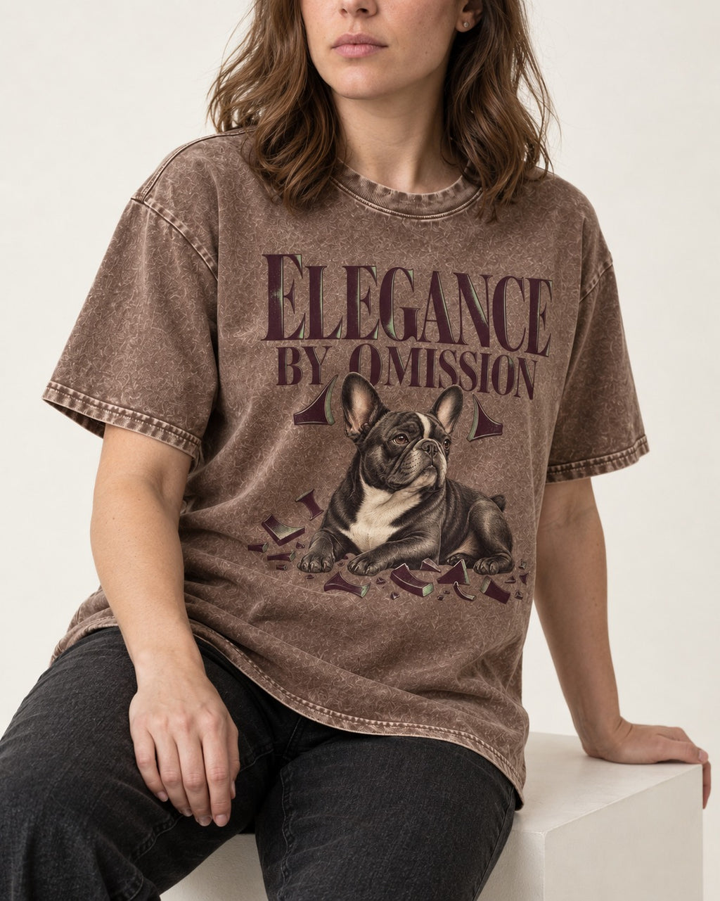 Frenchie Elegance by Omission Washed Tee in Coffee, worn by a seated model