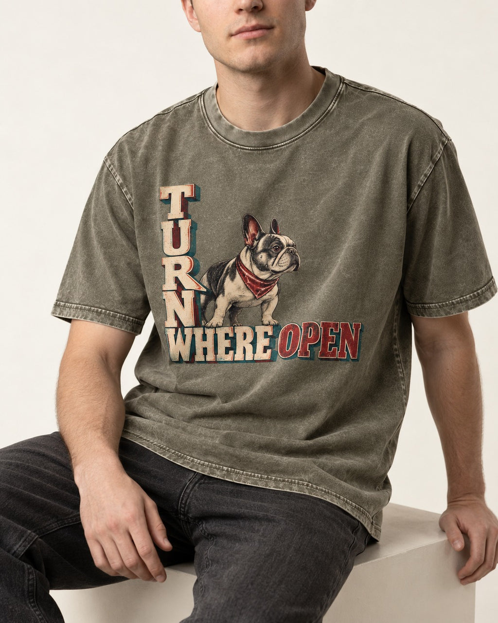 Turn Where Open Frenchie Washed Tee in Army Green, worn by a seated model