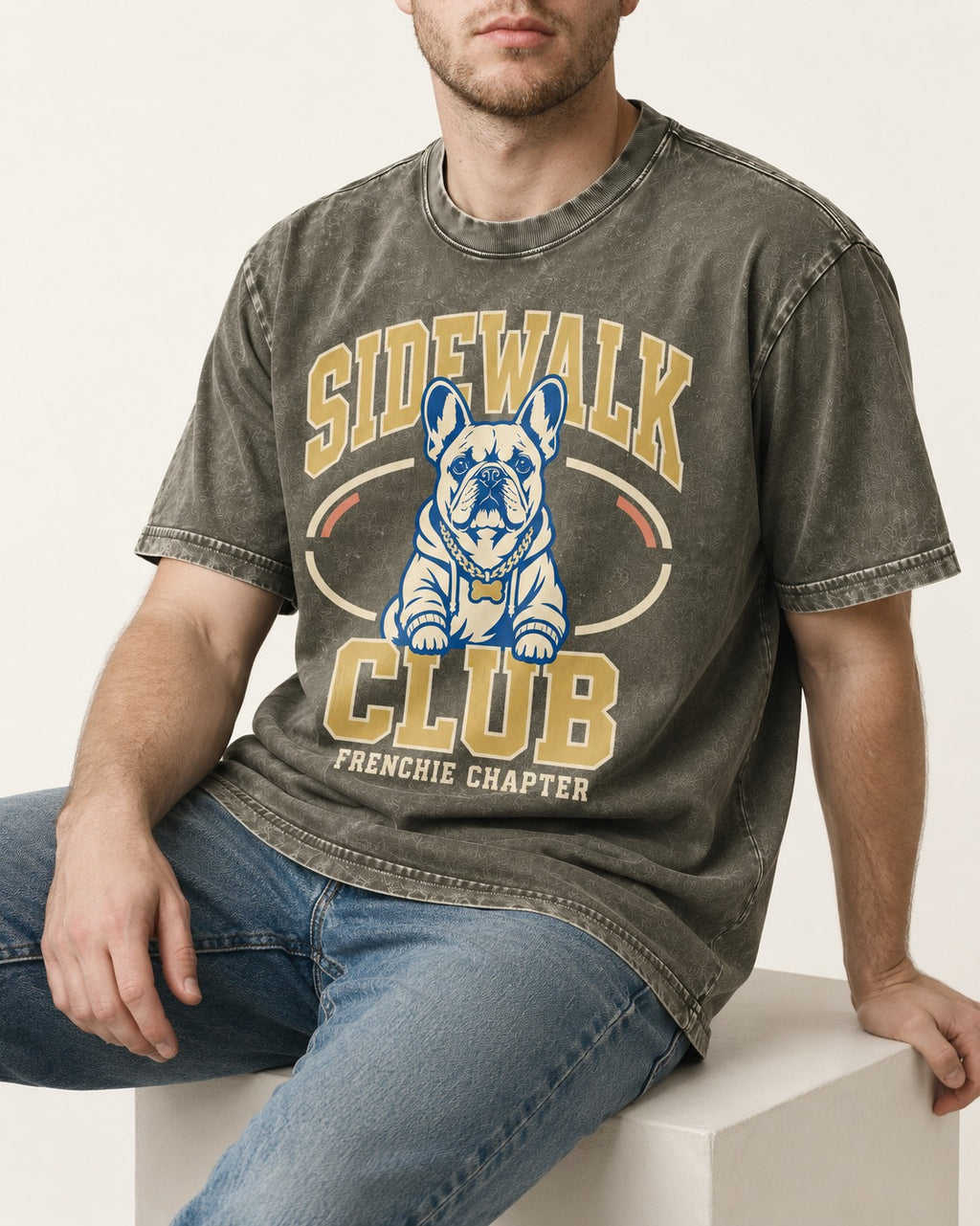 Frenchie Sidewalk Club Chapter Graphic Washed Tee in Army Green, worn by a seated model
