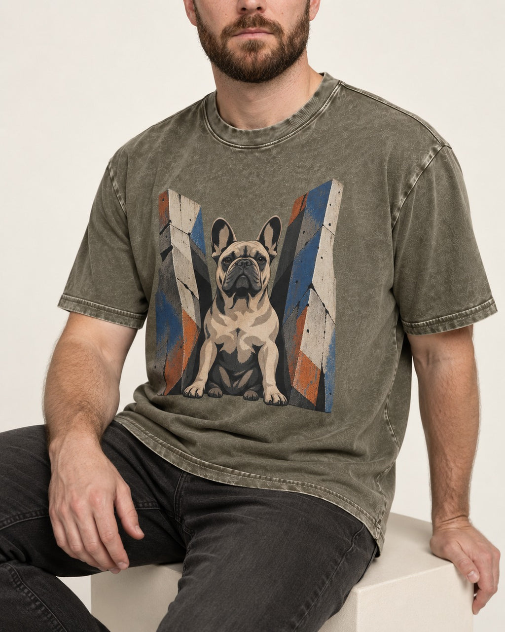 Frenchie Concrete Diplomat Barrier Portrait Washed Tee in Army Green, worn by a seated model