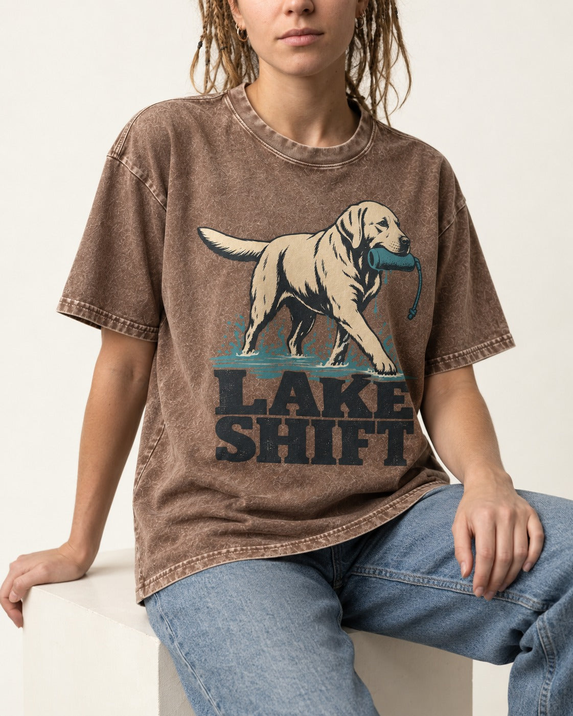 Lake Shift Labrador Retriever Washed Tee in Coffee, worn by a seated model