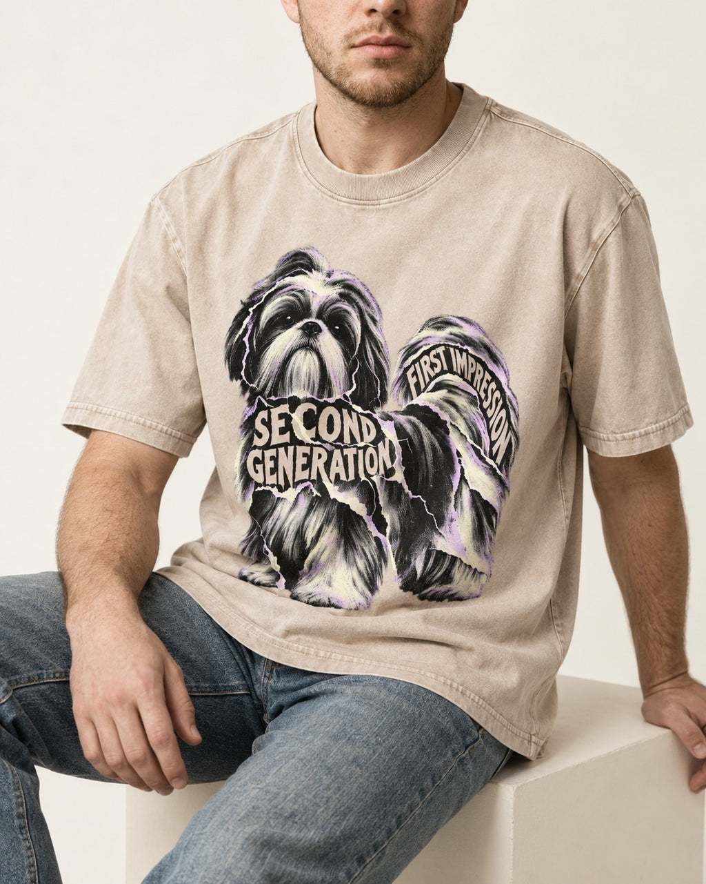 Second Generation Shih Tzu Washed Tee in Apricot, worn by a seated model