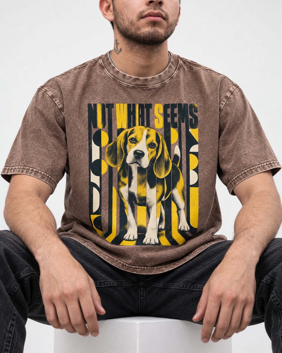 Not What It Seems Beagle Washed Tee in Coffee, worn by a seated model