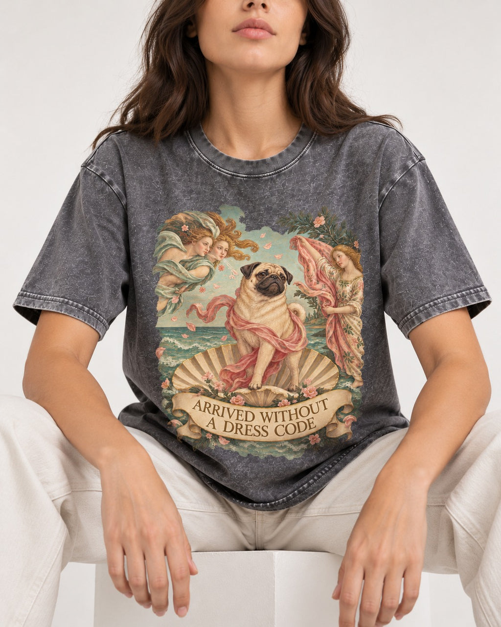 Pug Arrived Without a Dress Code Venus Parody Graphic Washed Tee in Gray, worn by a seated model