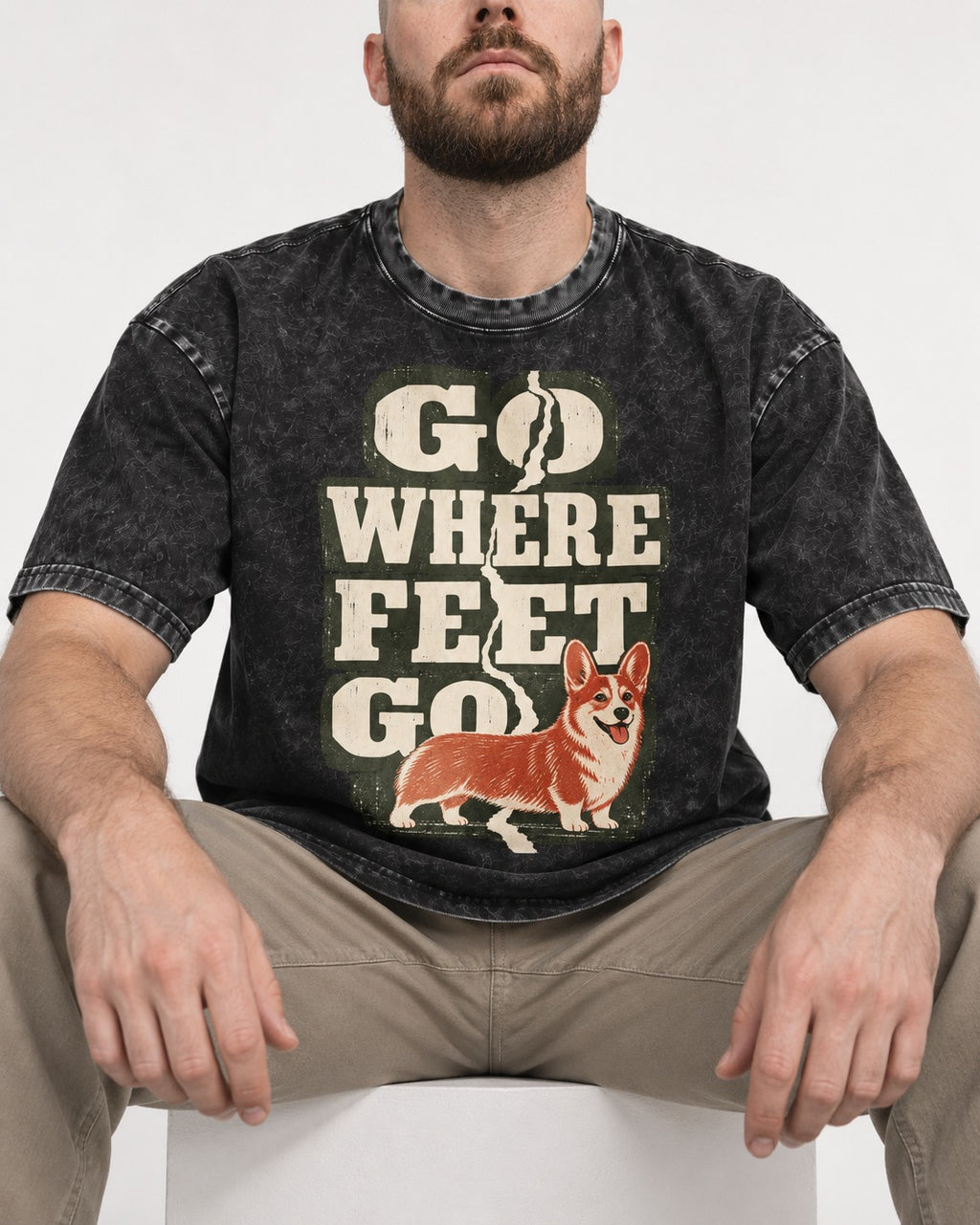 Corgi Go Where Feet Go Path Washed Tee in Black, worn by a seated model