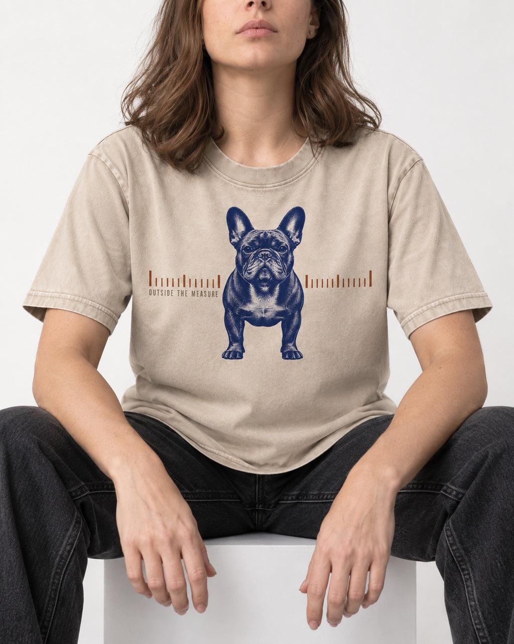 Frenchie Outside the Measure Washed Tee in Apricot, worn by a seated model