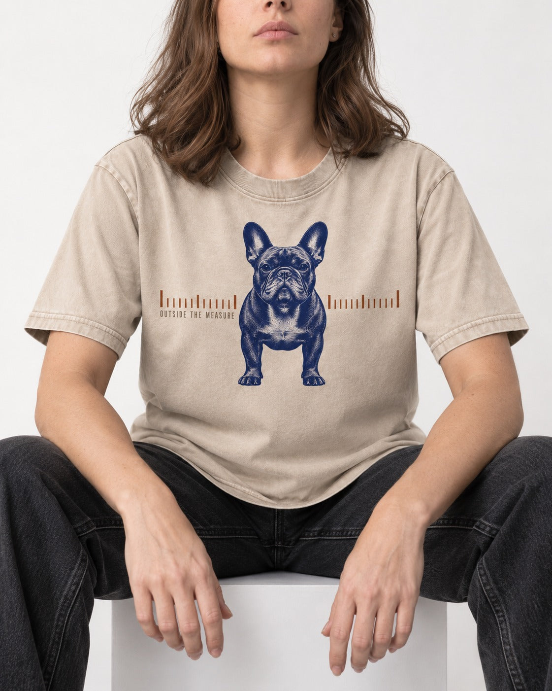 Frenchie Outside the Measure Washed Tee in Apricot, worn by a seated model