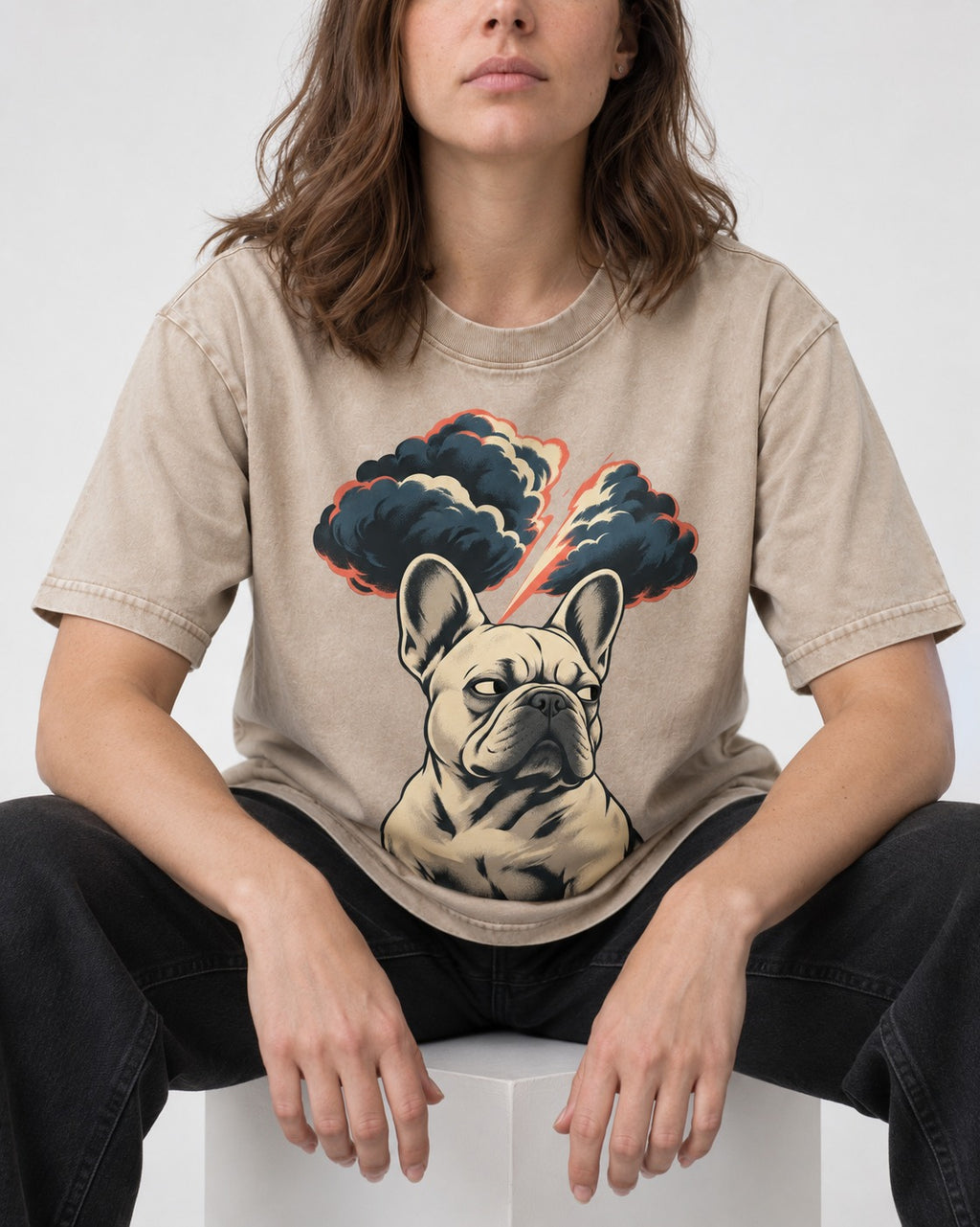 Frenchie Storm Warning Washed Tee in Apricot, worn by a seated model