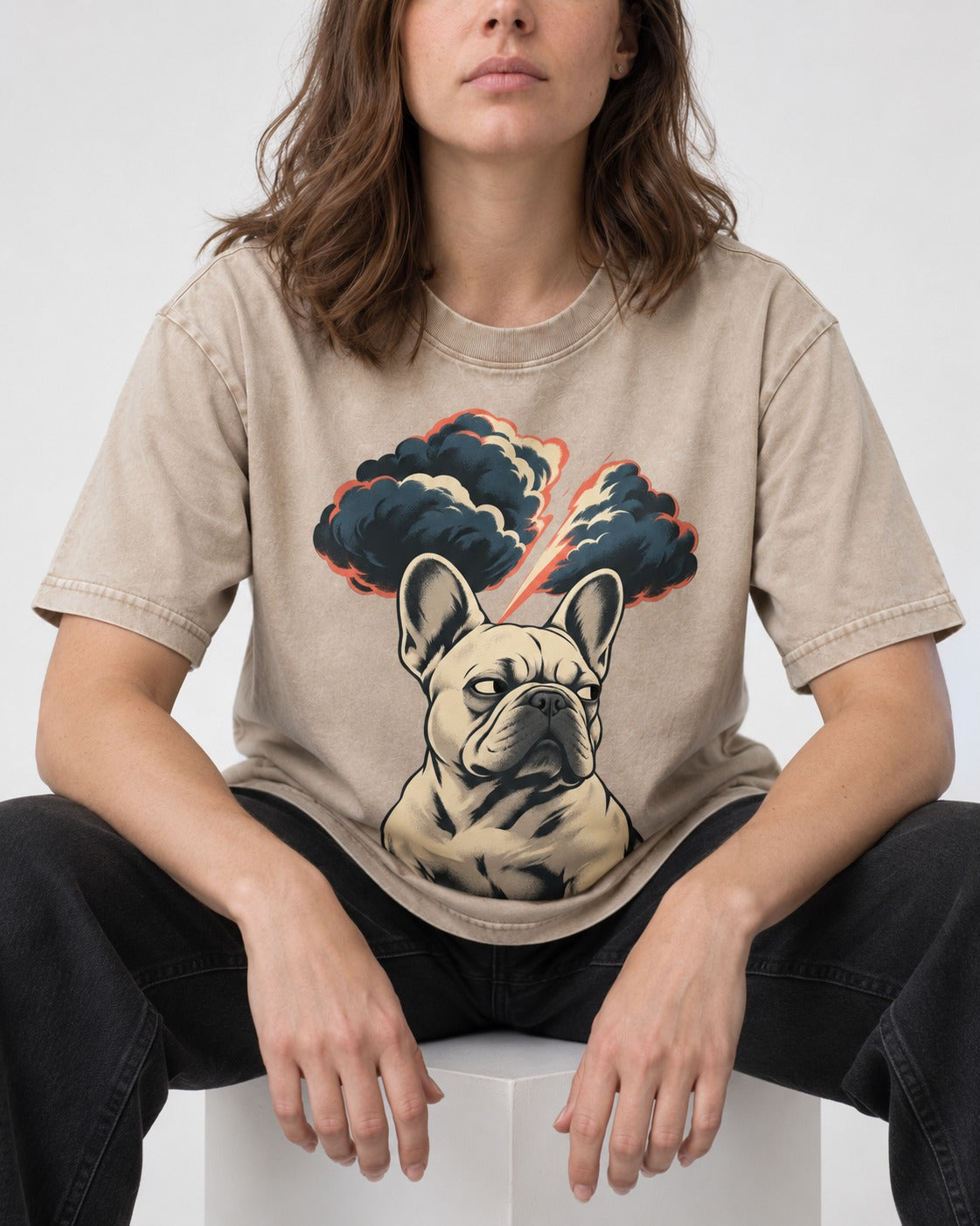 Frenchie Storm Warning Washed Tee in Apricot, worn by a seated model