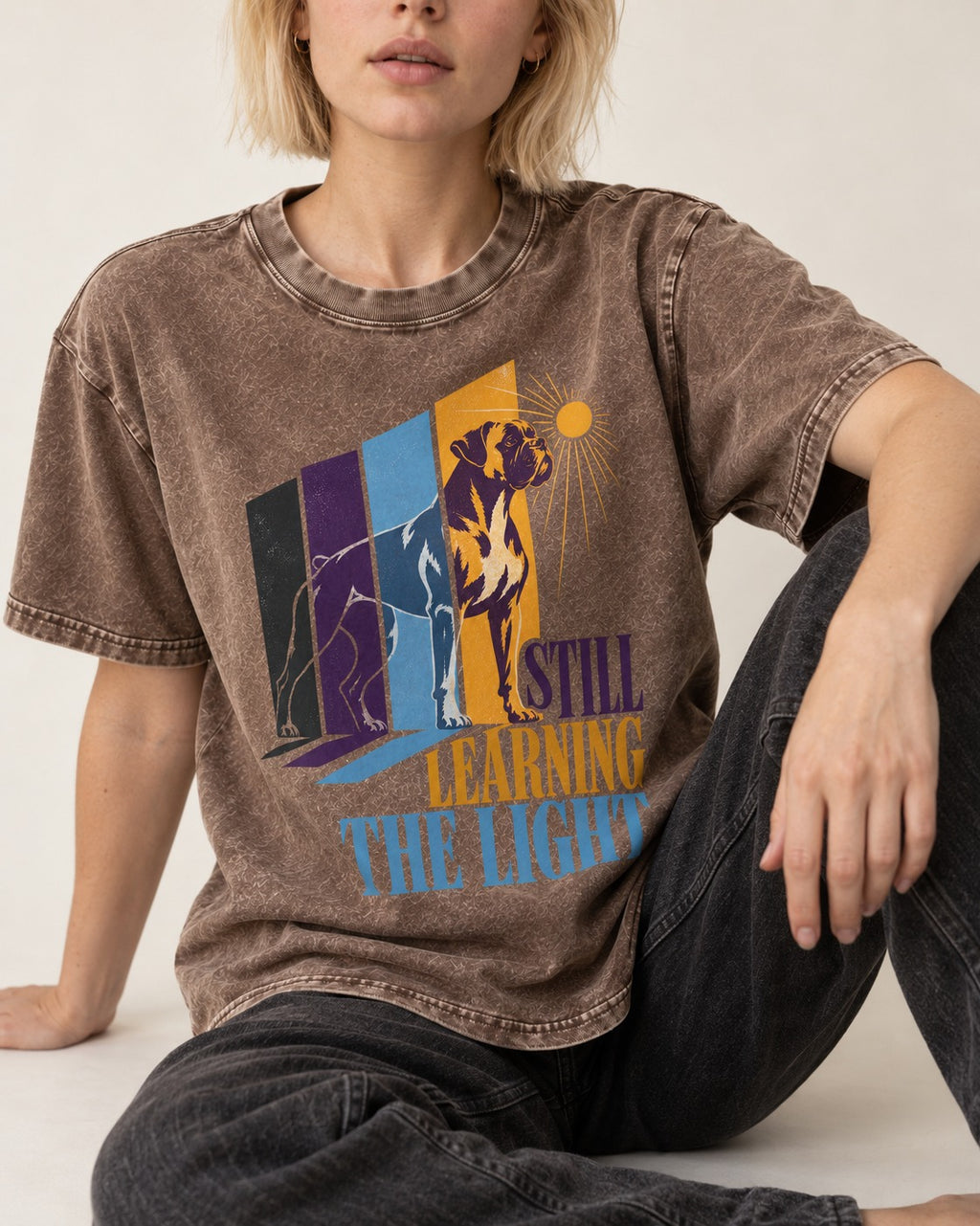 Still Learning the Light Boxer Doorway Progression Graphic Washed Tee in Coffee, worn by a seated model