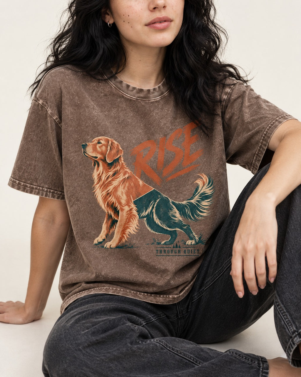 Golden Retriever Rise Through Quiet Washed Tee in Coffee, worn by a seated model