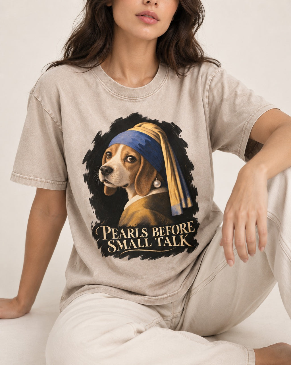 Beagle Paris Before Small Talk Washed Tee in Apricot, worn by a seated model