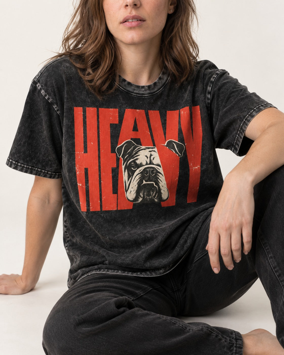 English Bulldog Heavy Stacked Portrait Graphic Washed Tee in Black, worn by a seated model