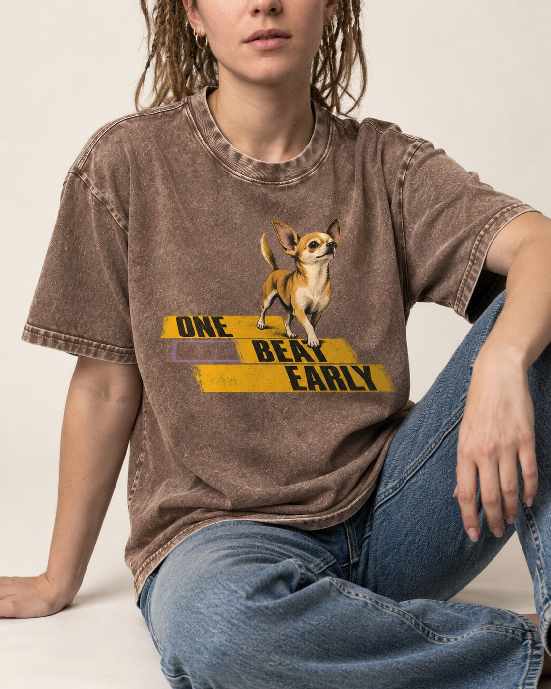 One Beat Early Chihuahua Washed Tee in Coffee, worn by a seated model