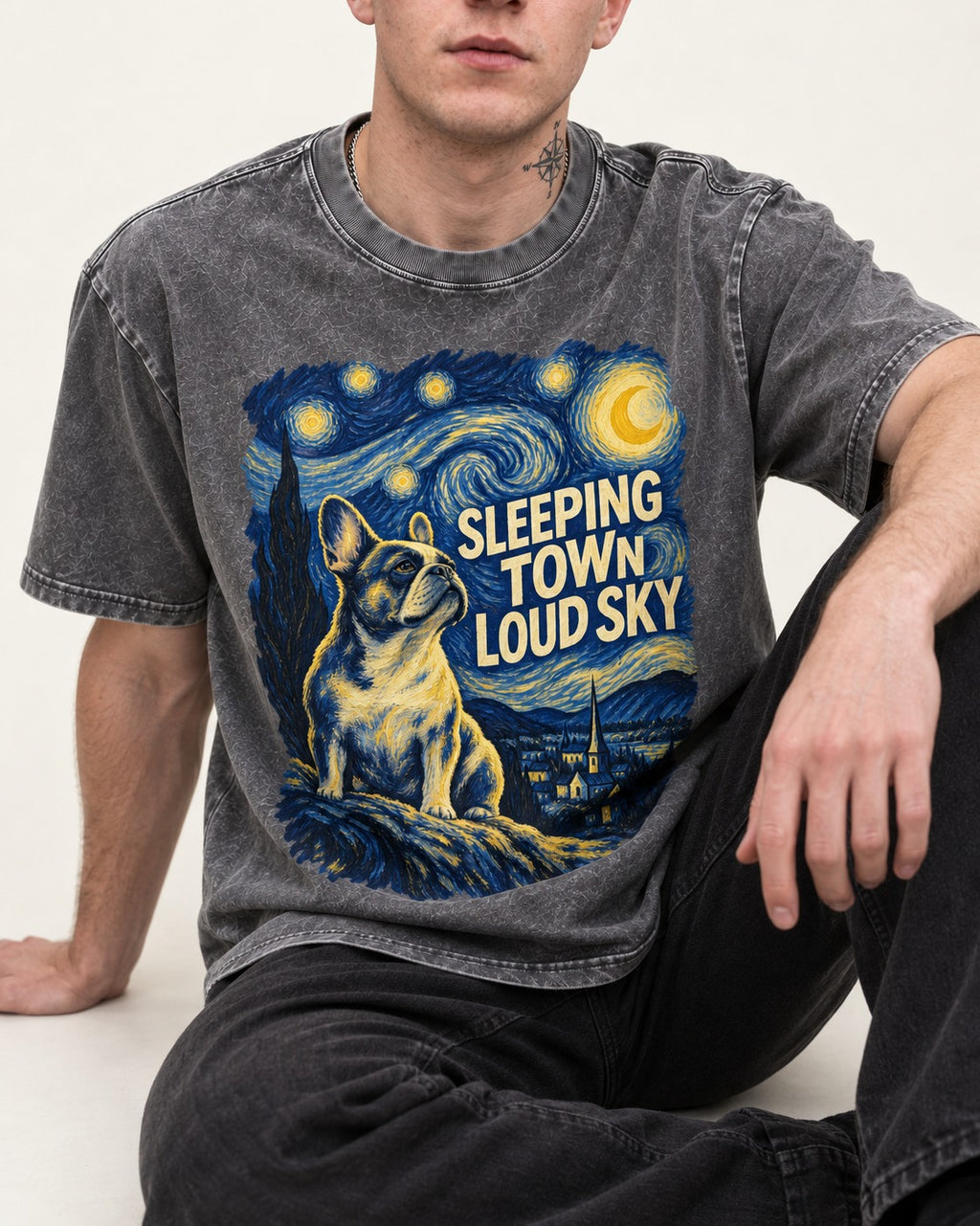 Frenchie Sleeping Town Loud Sky Graphic Washed Tee in Gray, worn by a seated model