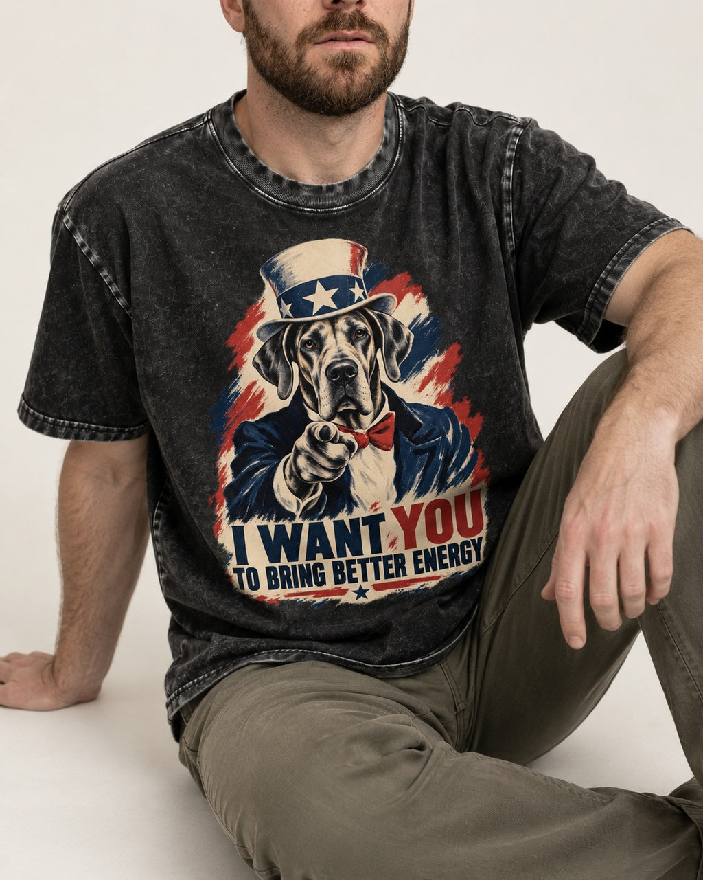 Great Dane I Want You to Bring Better Energy Uncle Sam Graphic Washed Tee in Black, worn by a seated model