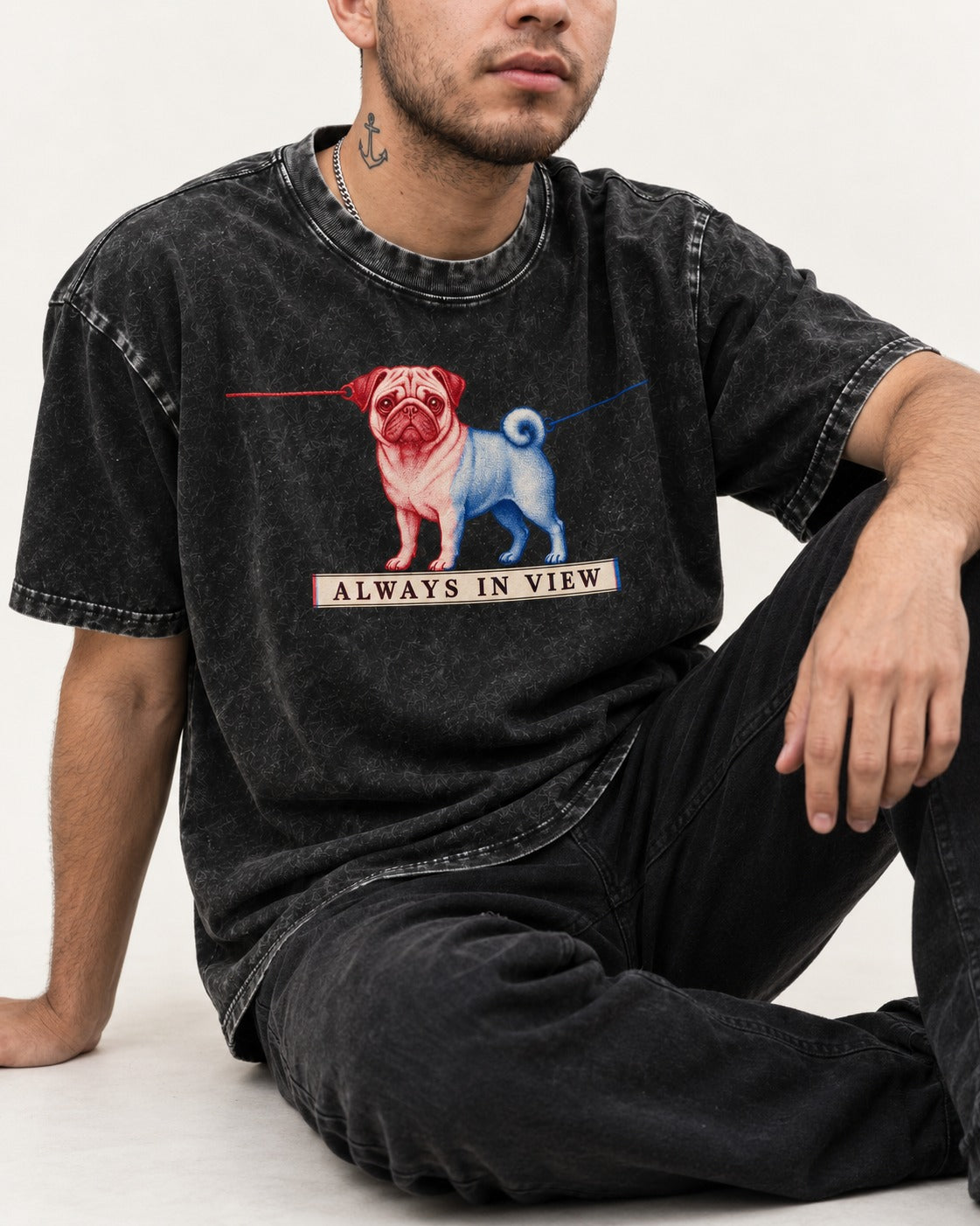 Pug Always in View Split Leash Graphic Washed Tee in Black, worn by a seated model