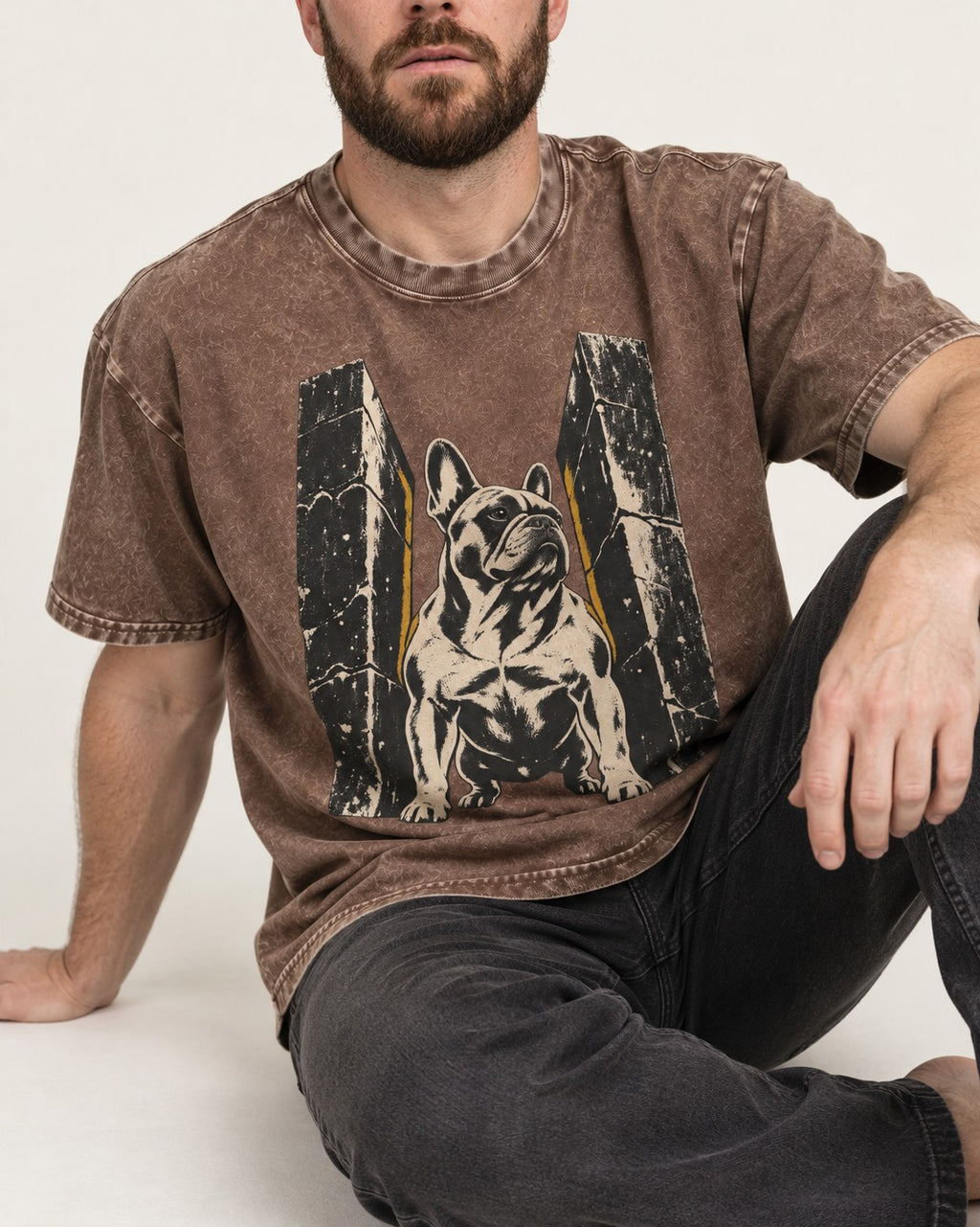 Frenchie Unbreakable Washed Tee in Coffee, worn by a seated model