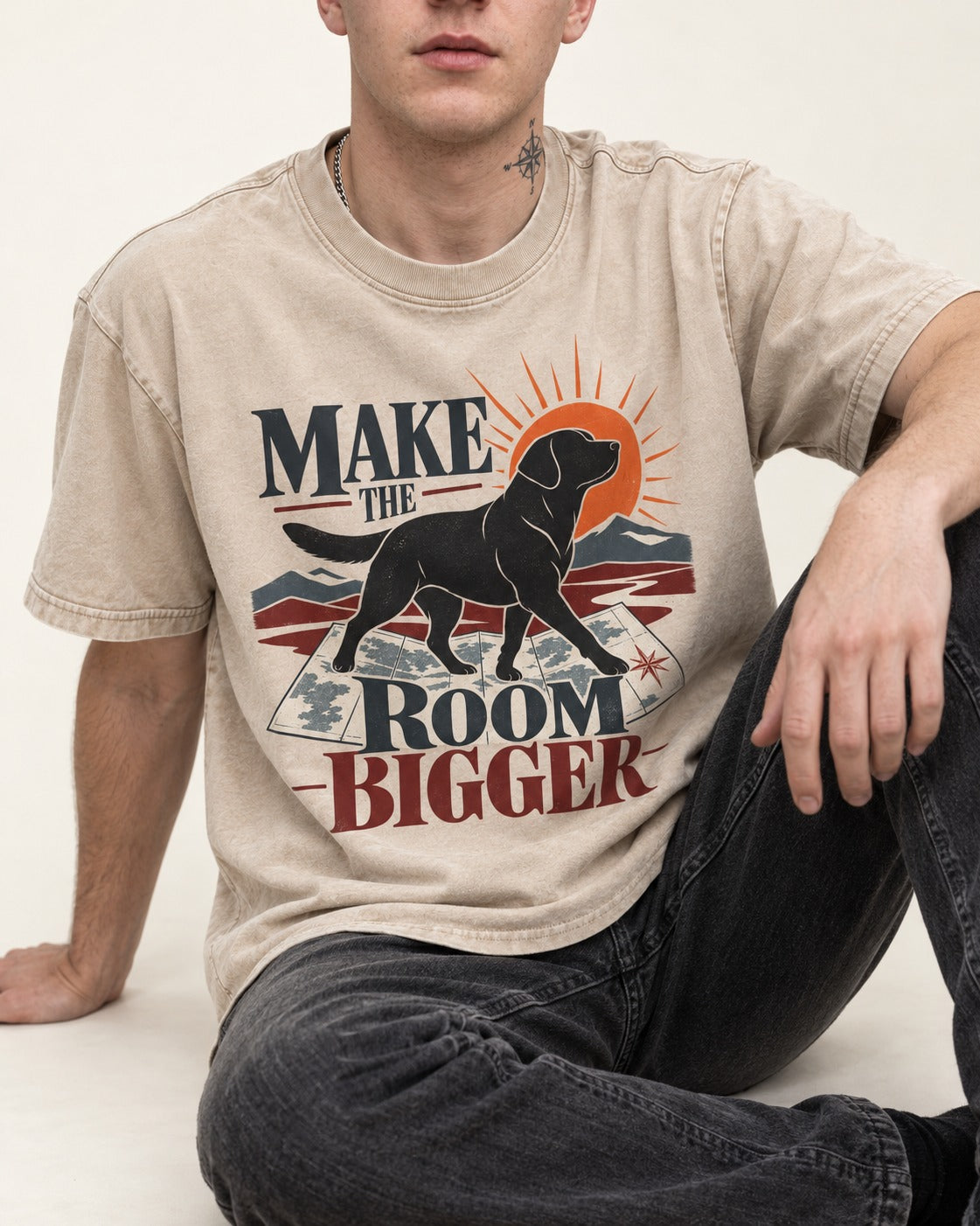 Make the Room Bigger Labrador Retriever Washed Tee in Apricot, worn by a seated model