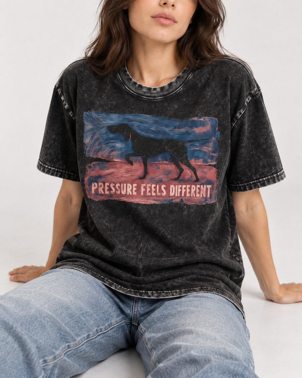 German Shorthaired Pointer Pressure Feels Different Monotype Graphic Washed Tee in Black, worn by a seated model