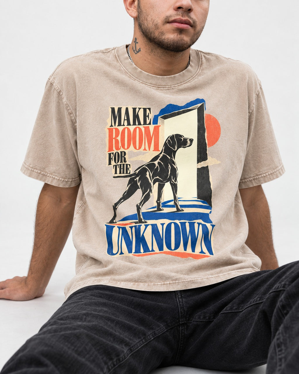 German Shorthaired Pointer Room for the Unknown Washed Tee in Apricot, worn by a seated model