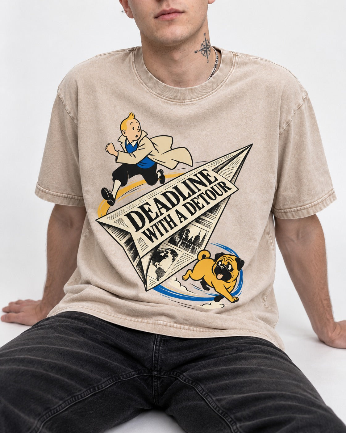 Deadline with a Pug Detour Washed Tee in Apricot, worn by a seated model